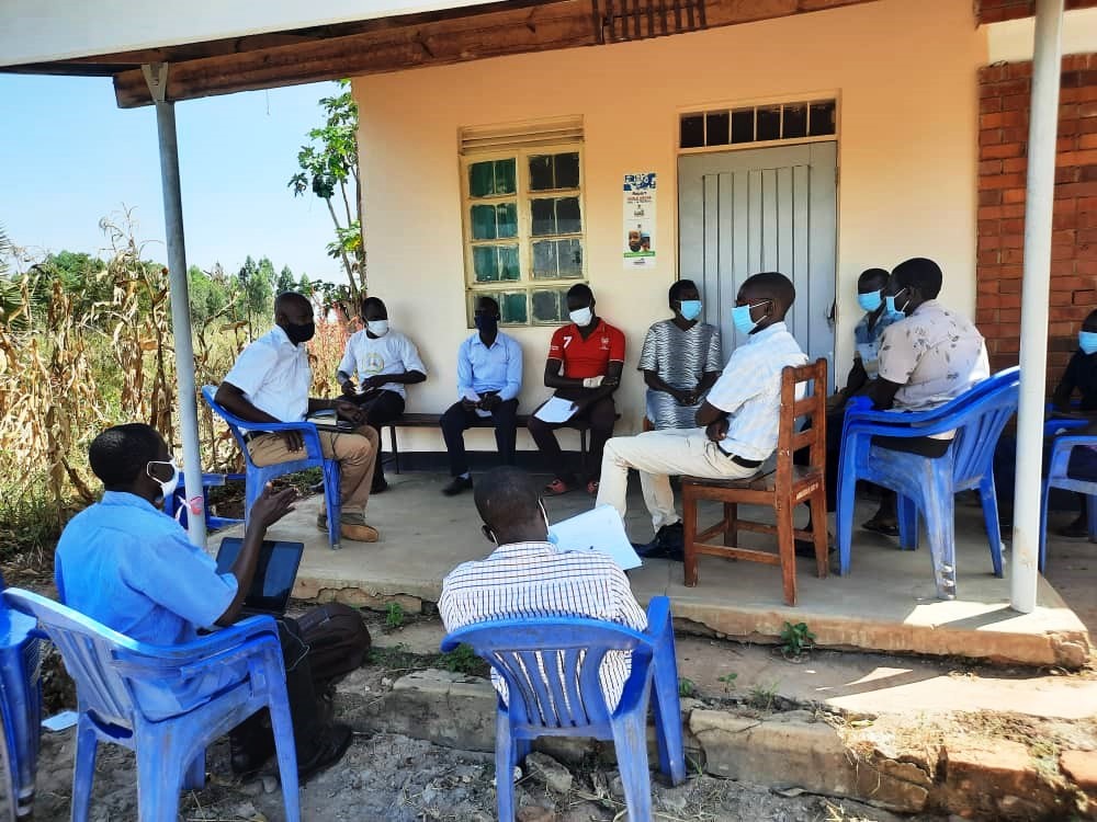 Health worker at Agulurude health center III, Oyam district being oriented by JCRC staff (TB/HIV officer) on TB Preventive Therapy (TPT) initiation for Children under 5 years.