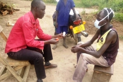 A health worker from Okwang HC III (Otuke District) who had followed up a TB client for Sputum smear